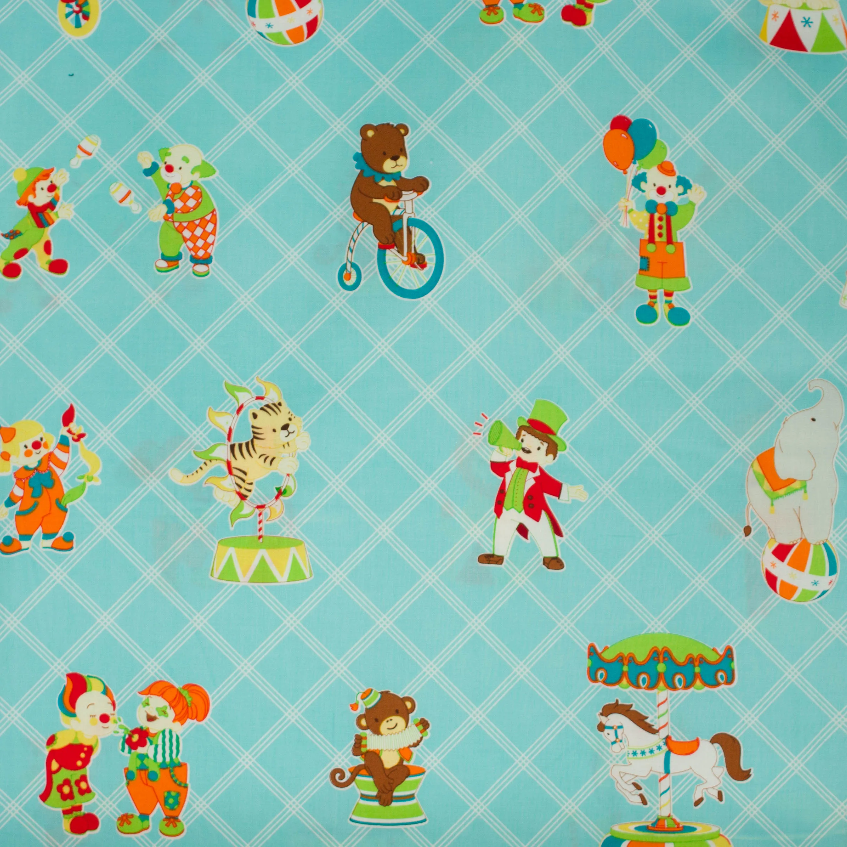 Katoen blauw met circusfiguren